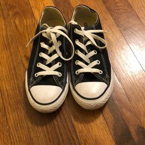 Black converse in a size 1.